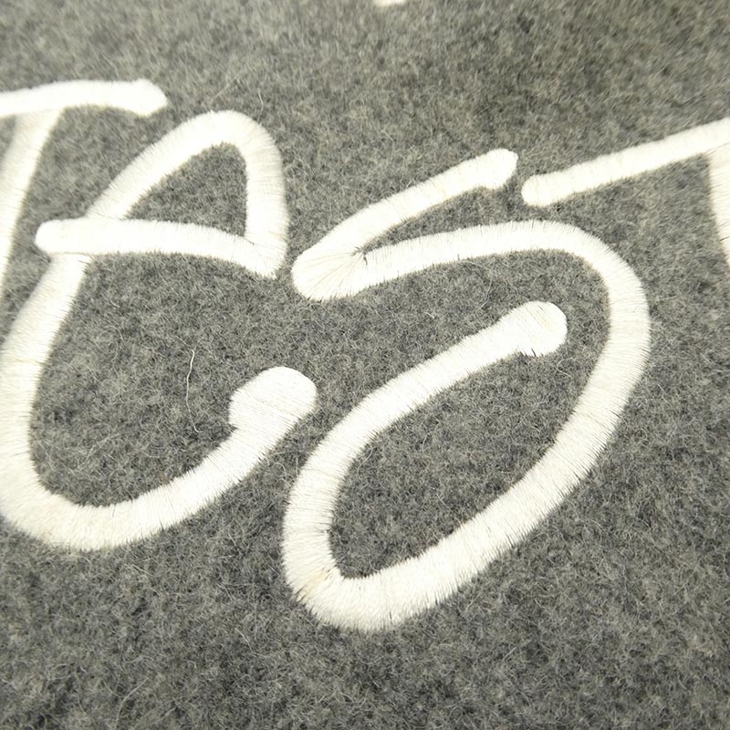 アベイシングエイプ 11SS × STUSSY 30周年記念 モデル Varsity jacket ステューシー 袖 レザー サルフェイス SSリンクロゴ ワッペン スタジャン バーシティジャケット 買取実績 画像