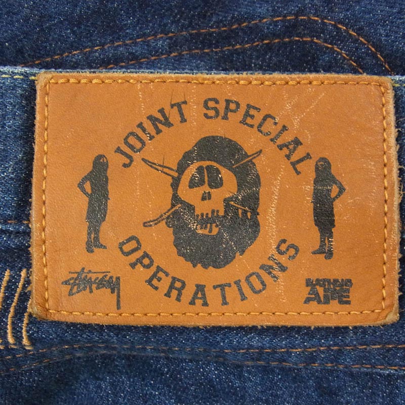アベイシングエイプ STUSSY ステューシー 30周年記念 モデル APE FACE SSリンク 刺繍 デニム パンツ 買取実績 画像