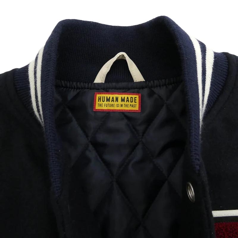 ヒューマンメイド 26SS HM30JK043 VARSITY JACKET バーシティ ジャケット ロゴ タイガー サガラ ワッペン ウールメルトン レザー スタジャン ロゴプリント ハンガ－ 買取実績 画像