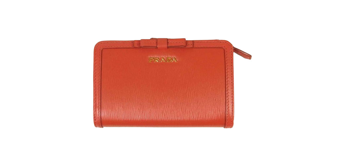 プラダ 1ML225 2B6S VITELLO MOVE FI リボン 2つ折り 財布 買取実績
