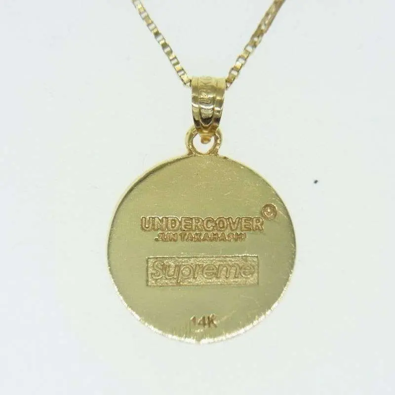 シュプリーム × UNDERCOVER 18SS Public Enemy 14K Gold Pendant 買取実績